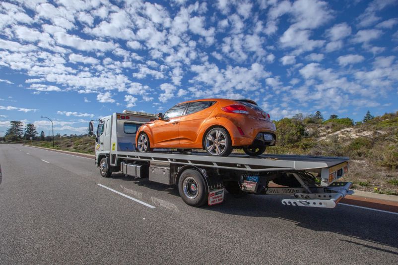 The Benefits of a Flatbed Tow Truck